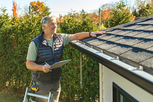 Professional Flat Roof Repair technician working in Aredale, IA